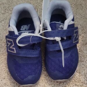 New Balance Blue Sneakers with Velcro Strap and Padded Collar